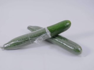 Partially wrapped cucumbers. Photo by Michael Ebardt/Shutterstock.com