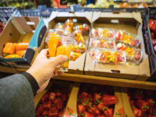 Peppers may be displayed packed or loose in the supermarket. Photo by Vera Petrunina/Shutterstock.com